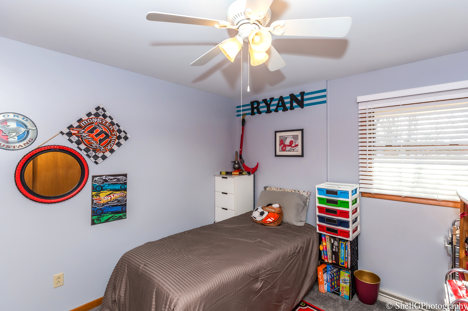 707 Amber Road New Lenox, IL 60451 - Photo 14 of 24 a bedroom with a bed and a chandelier