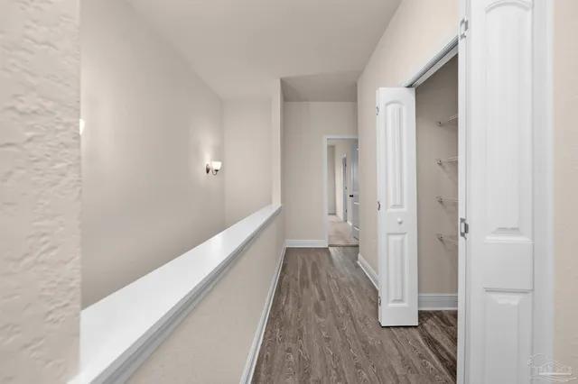 a view of a bathroom with wooden floor