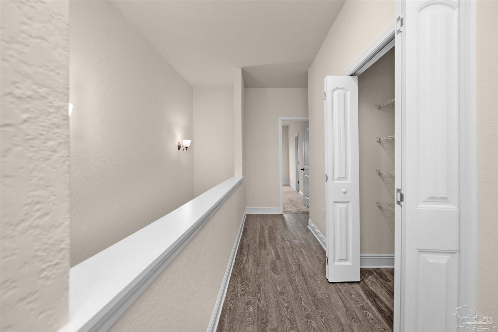 5069 Peach Drive Pace, FL 32571 - Photo 21 of 41 a view of a bathroom with wooden floor