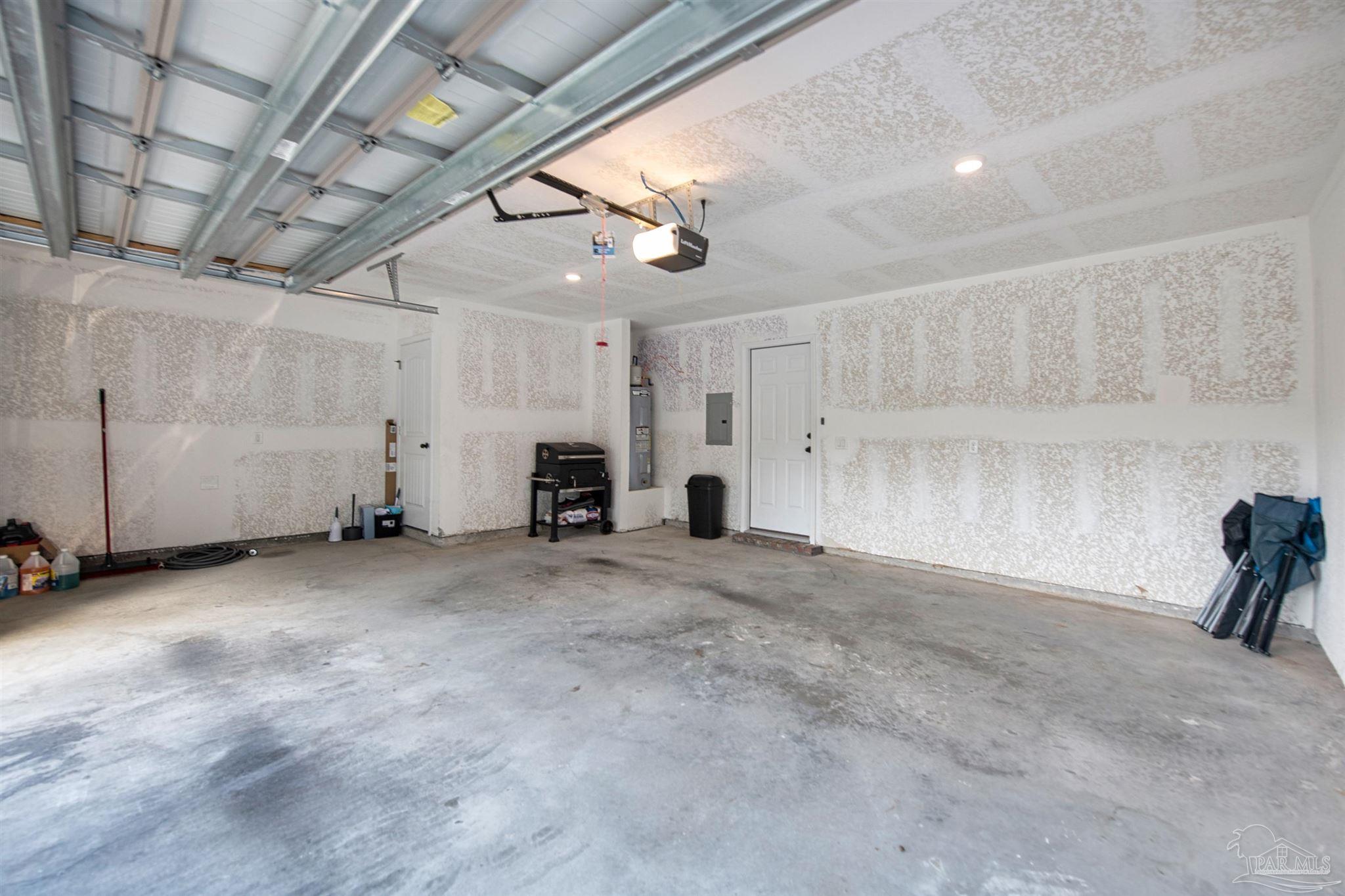 5069 Peach Drive Pace, FL 32571 - Photo 34 of 41 a view of a livingroom with furniture and a ceiling fan
