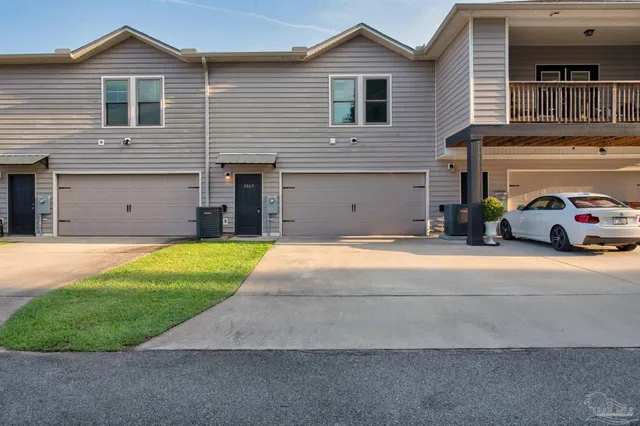 a house view with a garden space