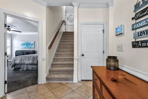 a view of entryway and hall with a window