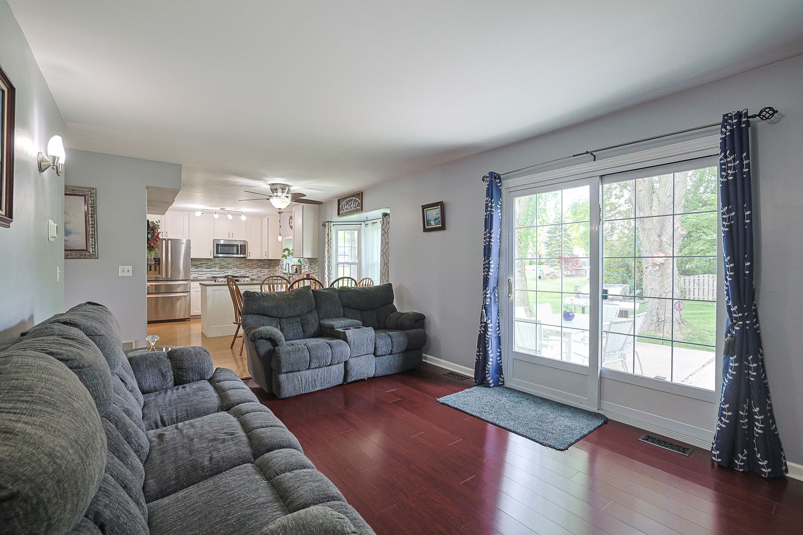 830 Hawk Lane Carol Stream, IL 60188 - Photo 9 of 30 a living room with furniture and a large window