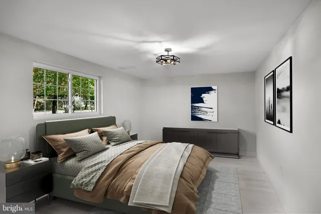 a bedroom with bed and window