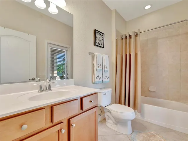 a view of a backyard with sitting area