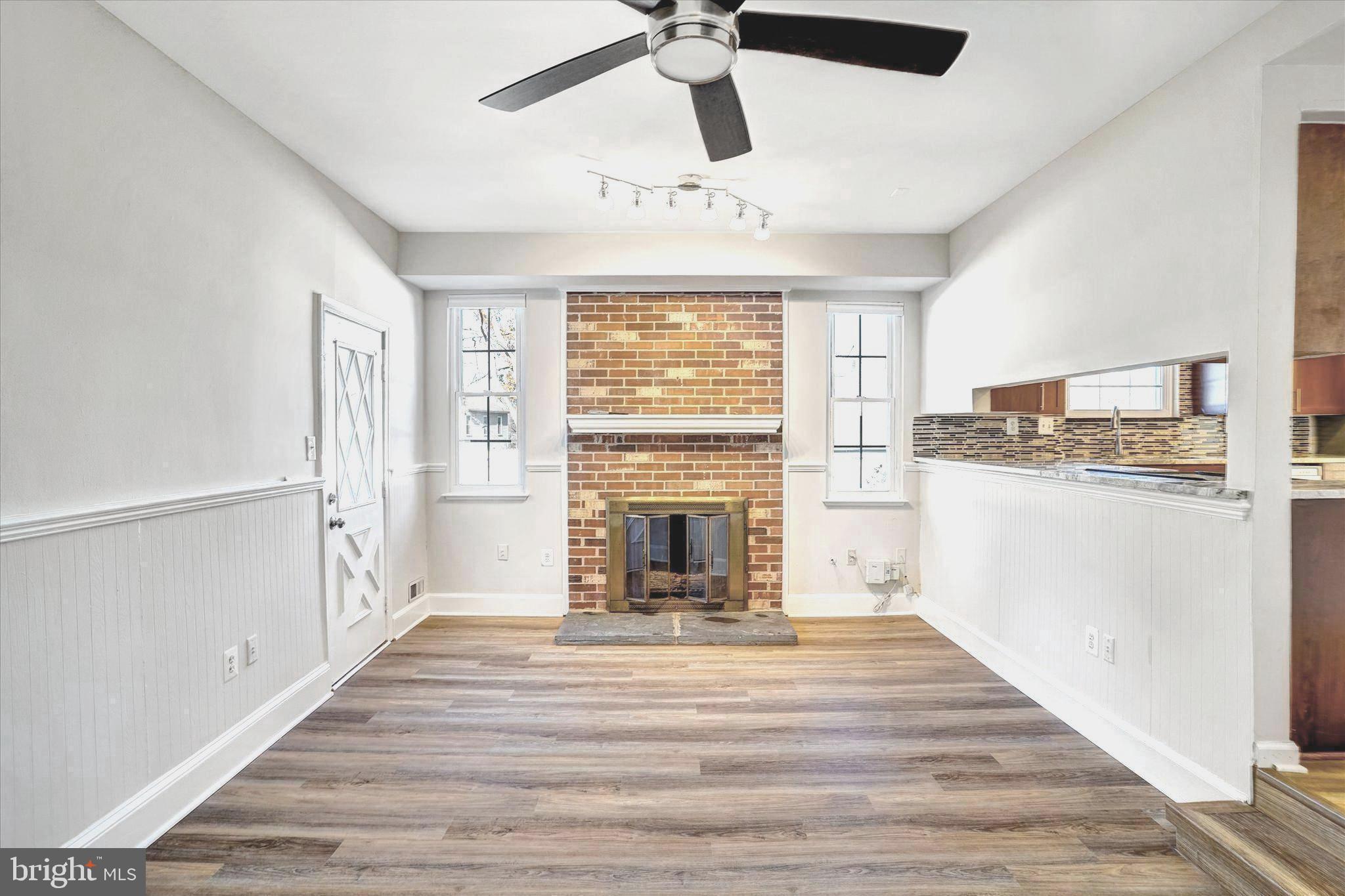 1324 Rock Chapel Road Herndon, VA 20170 - Photo 18 of 42 a living room with stainless steel appliances granite countertop furniture and a fireplace
