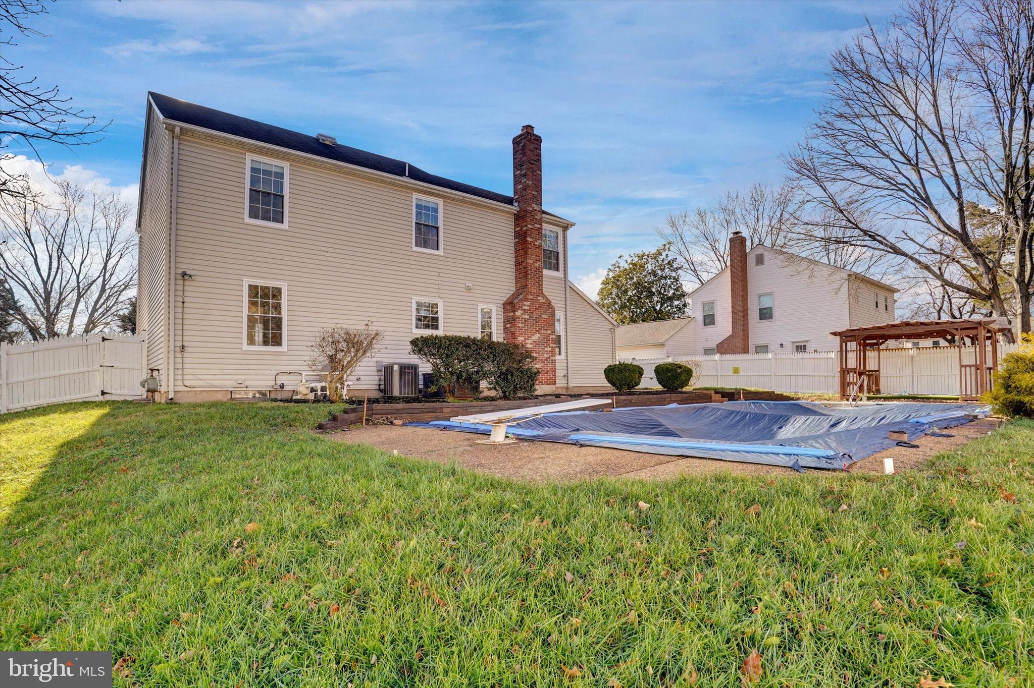 1324 Rock Chapel Road Herndon, VA 20170 - Photo 37 of 42 a view of a house with backyard and sitting area