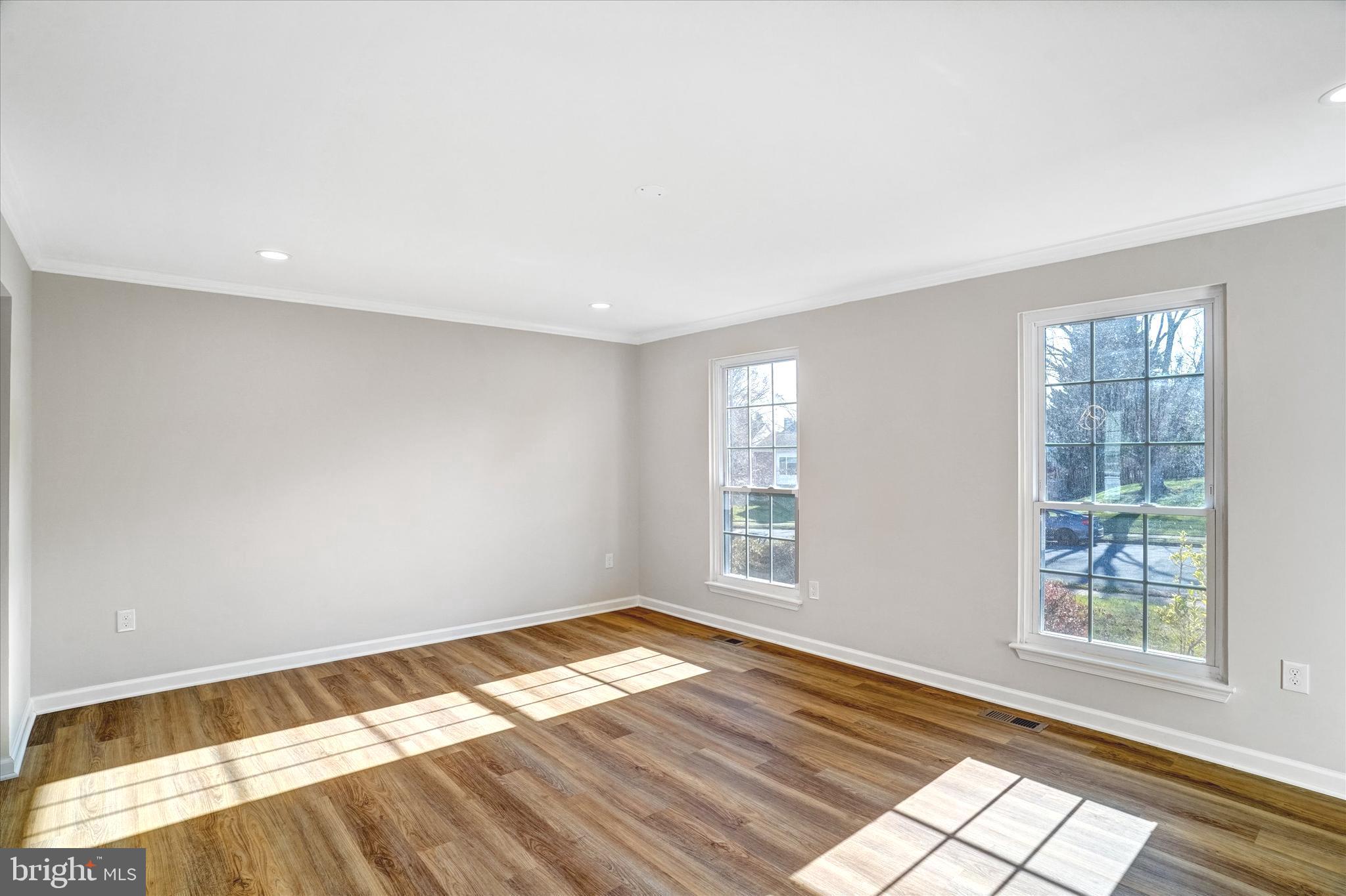 1324 Rock Chapel Road Herndon, VA 20170 - Photo 6 of 42 a view of empty room with wooden floor and fan