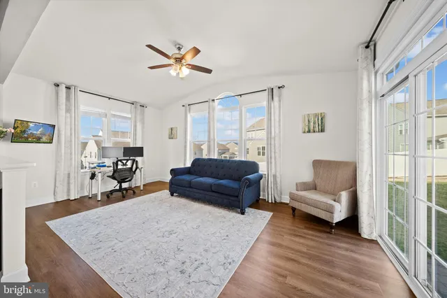 a living room with furniture and a couch