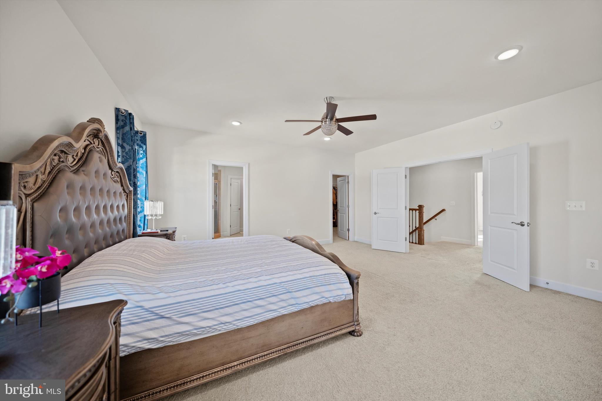 8690 Belle Grove Way Manassas, VA 20110 - Photo 20 of 55 a bedroom with a bed and a dresser