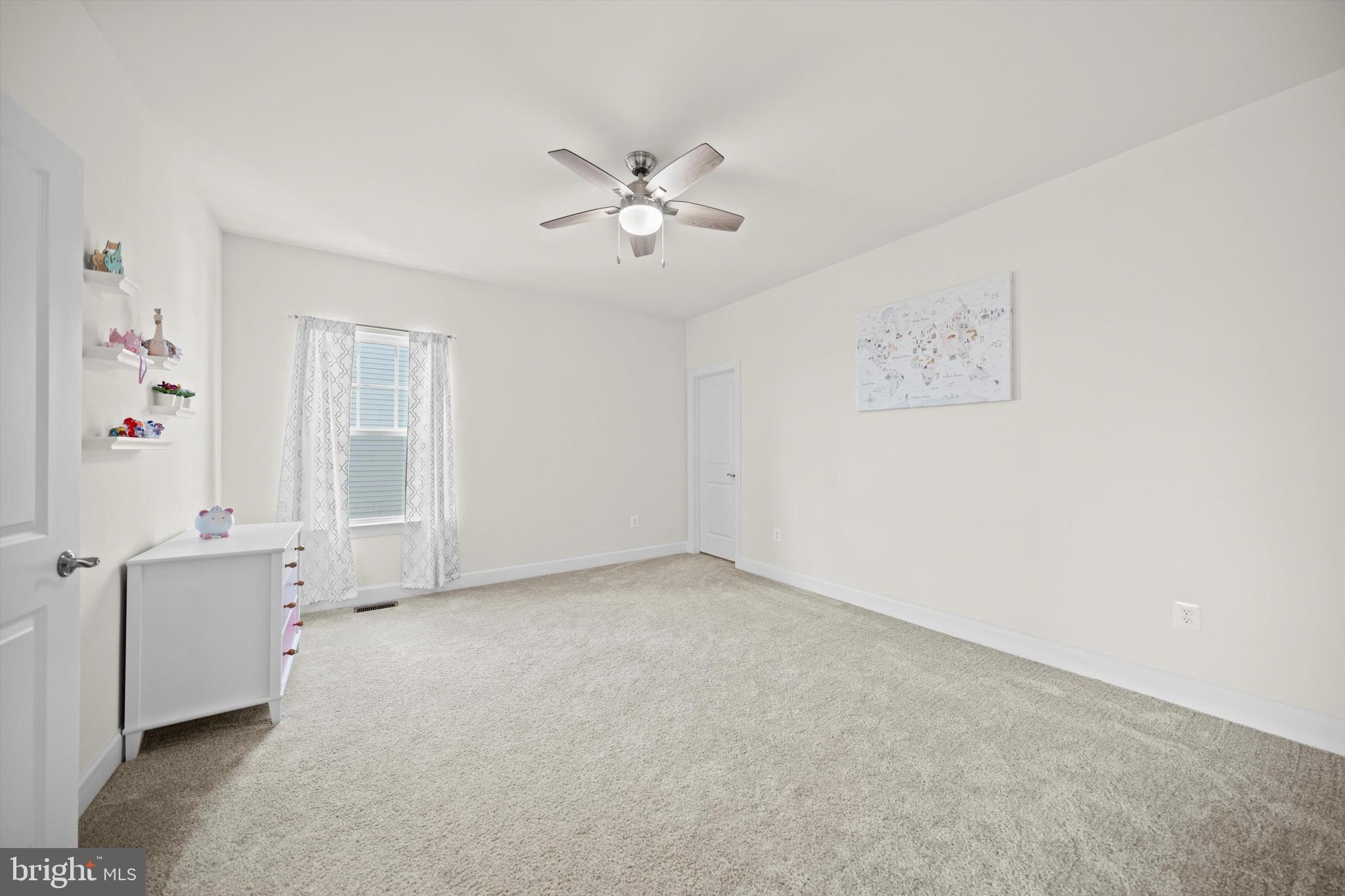 8690 Belle Grove Way Manassas, VA 20110 - Photo 24 of 55 a view of an empty room with a window