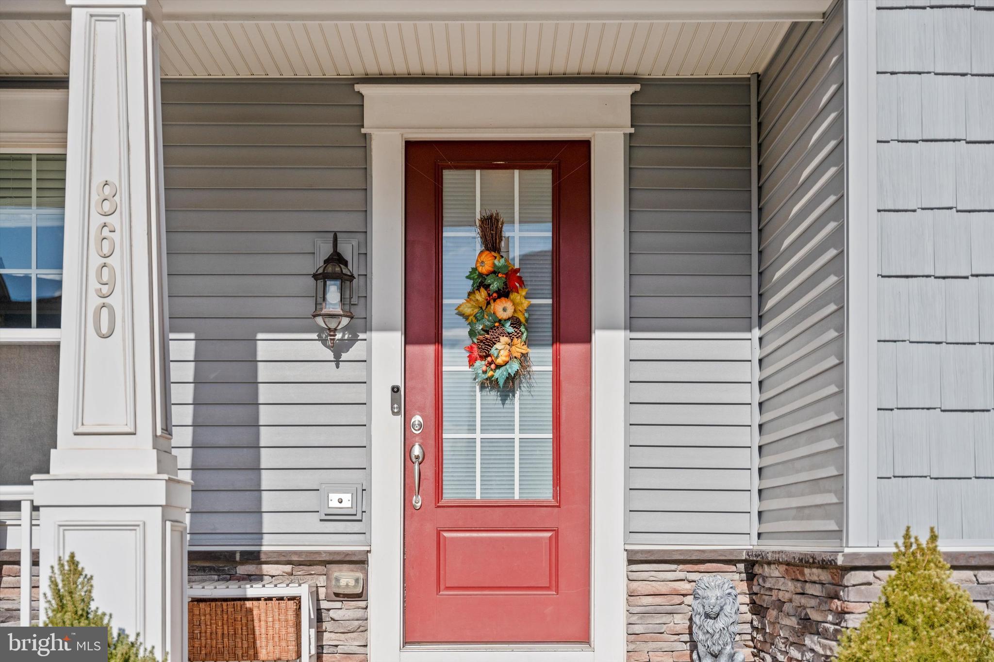 8690 Belle Grove Way Manassas, VA 20110 - Photo 3 of 55 a view of a door and a window