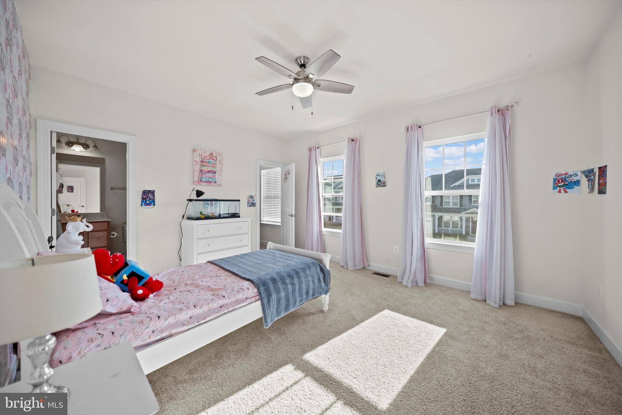 8690 Belle Grove Way Manassas, VA 20110 - Photo 31 of 55 a living room with furniture and kitchen view