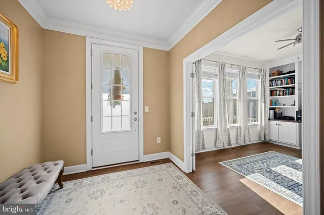 a view of livingroom with window and hardwood floor