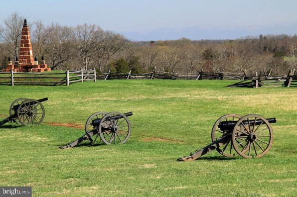 8690 Belle Grove Way Manassas, VA 20110 - Photo 49 of 55 a view of a table and chairs in the garden