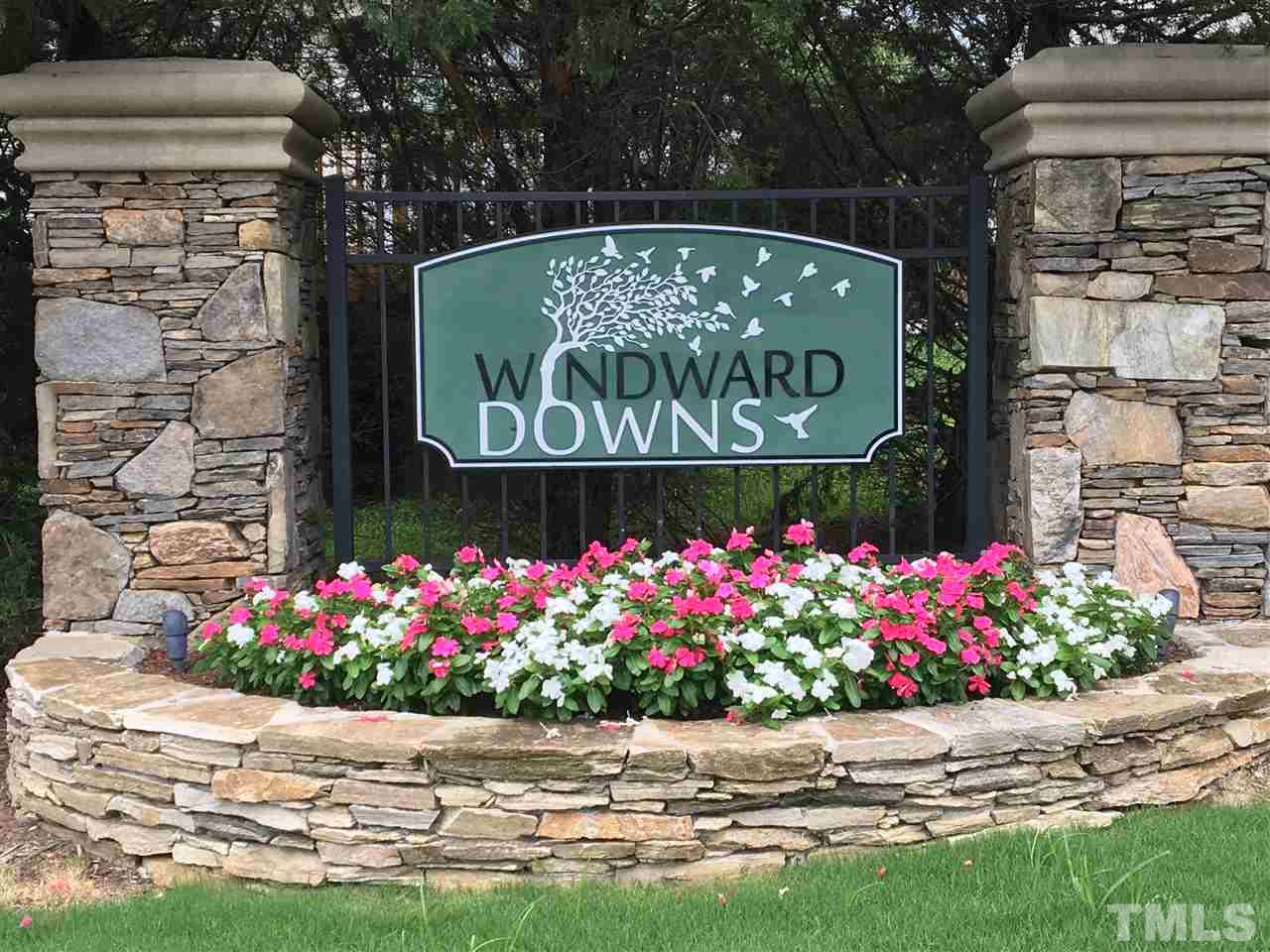 4313 Windlass Court Raleigh, NC 27616 - Photo 22 of 22 a street sign that is in front of flowers