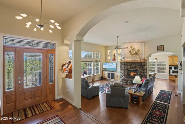 a kitchen with stainless steel appliances granite countertop a stove and a refrigerator