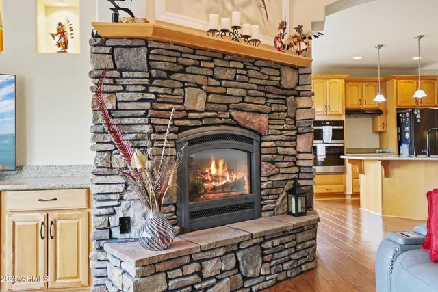 a bathroom with a sink mirror and toilet
