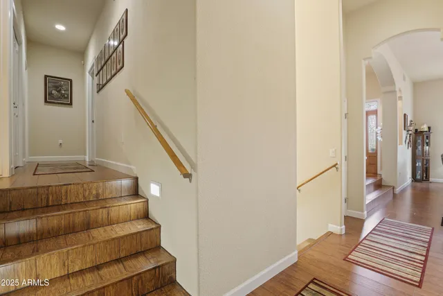 a en suite bathroom with a sink double vanity and a mirror