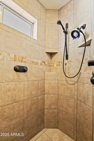 a front view of a house with yard and furniture