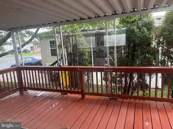 a view of backyard with green space
