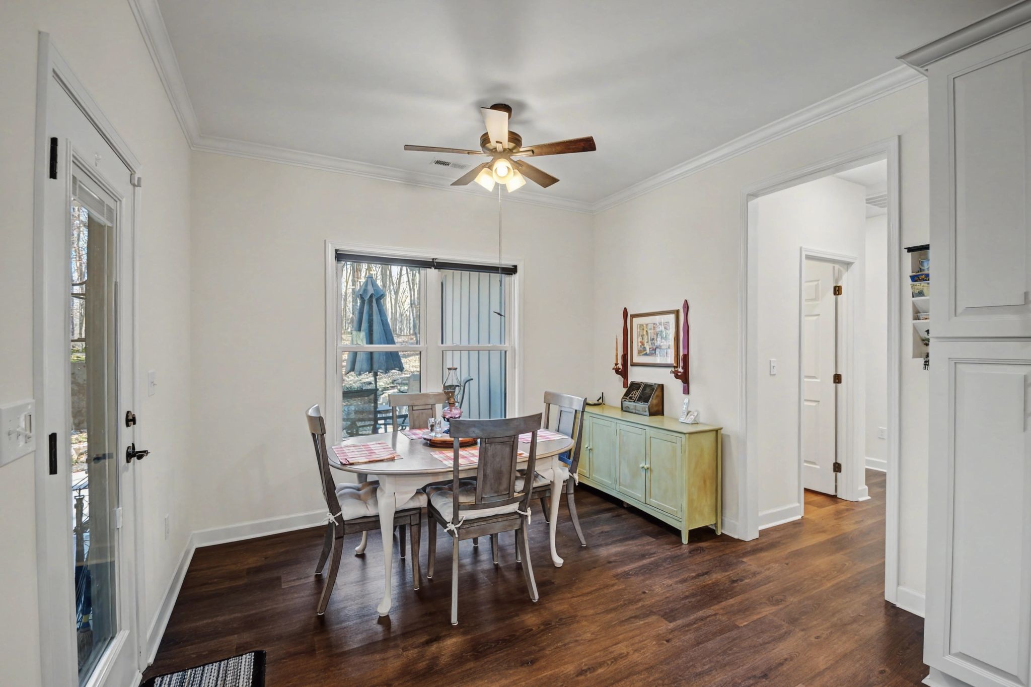 765 Scenic Circle Pulaski, TN 38478 - Photo 13 of 46 a dining room with furniture a chandelier and wooden floor