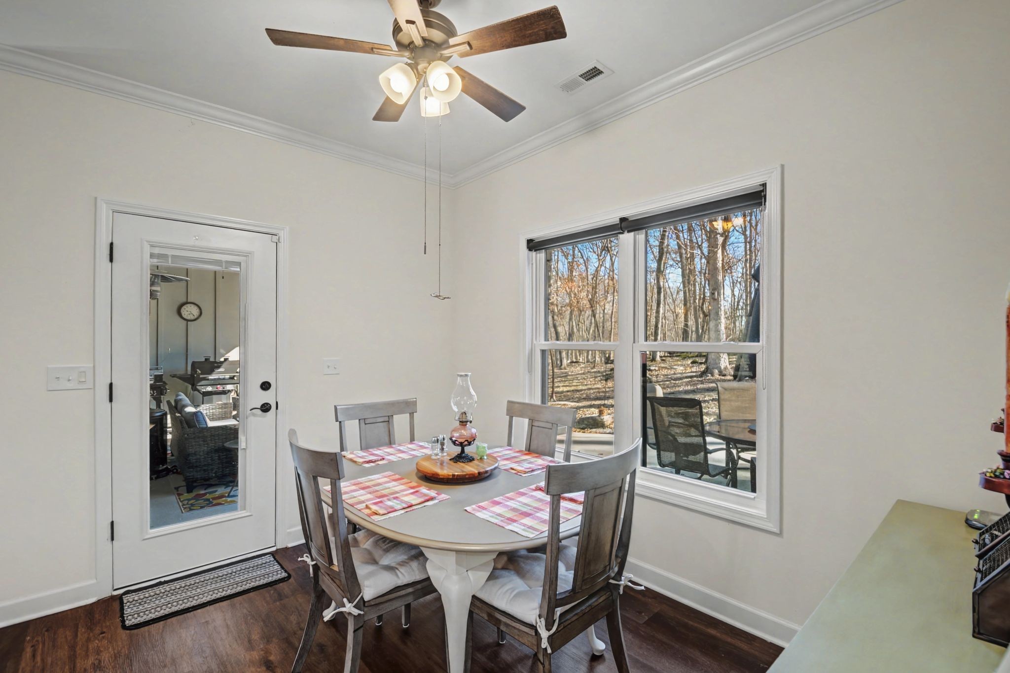 765 Scenic Circle Pulaski, TN 38478 - Photo 14 of 46 a view of a dining room with furniture window and wooden floor