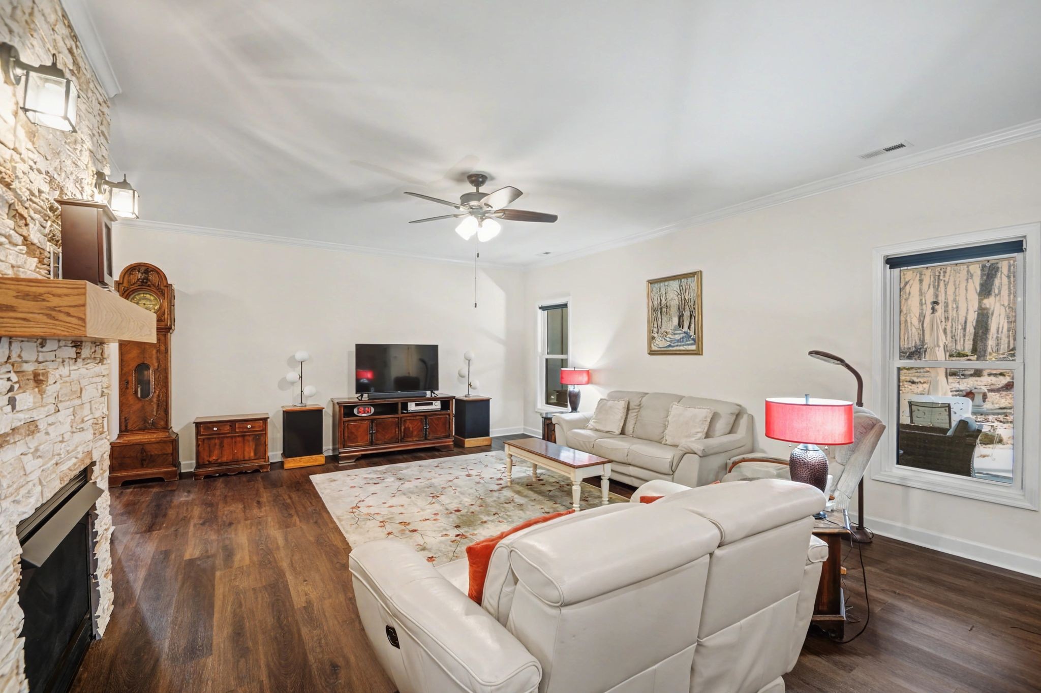 765 Scenic Circle Pulaski, TN 38478 - Photo 16 of 46 a living room with furniture and a flat screen tv