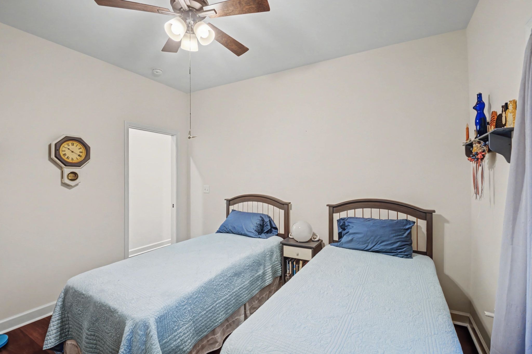 765 Scenic Circle Pulaski, TN 38478 - Photo 27 of 46 a bedroom with a bed and a chandelier
