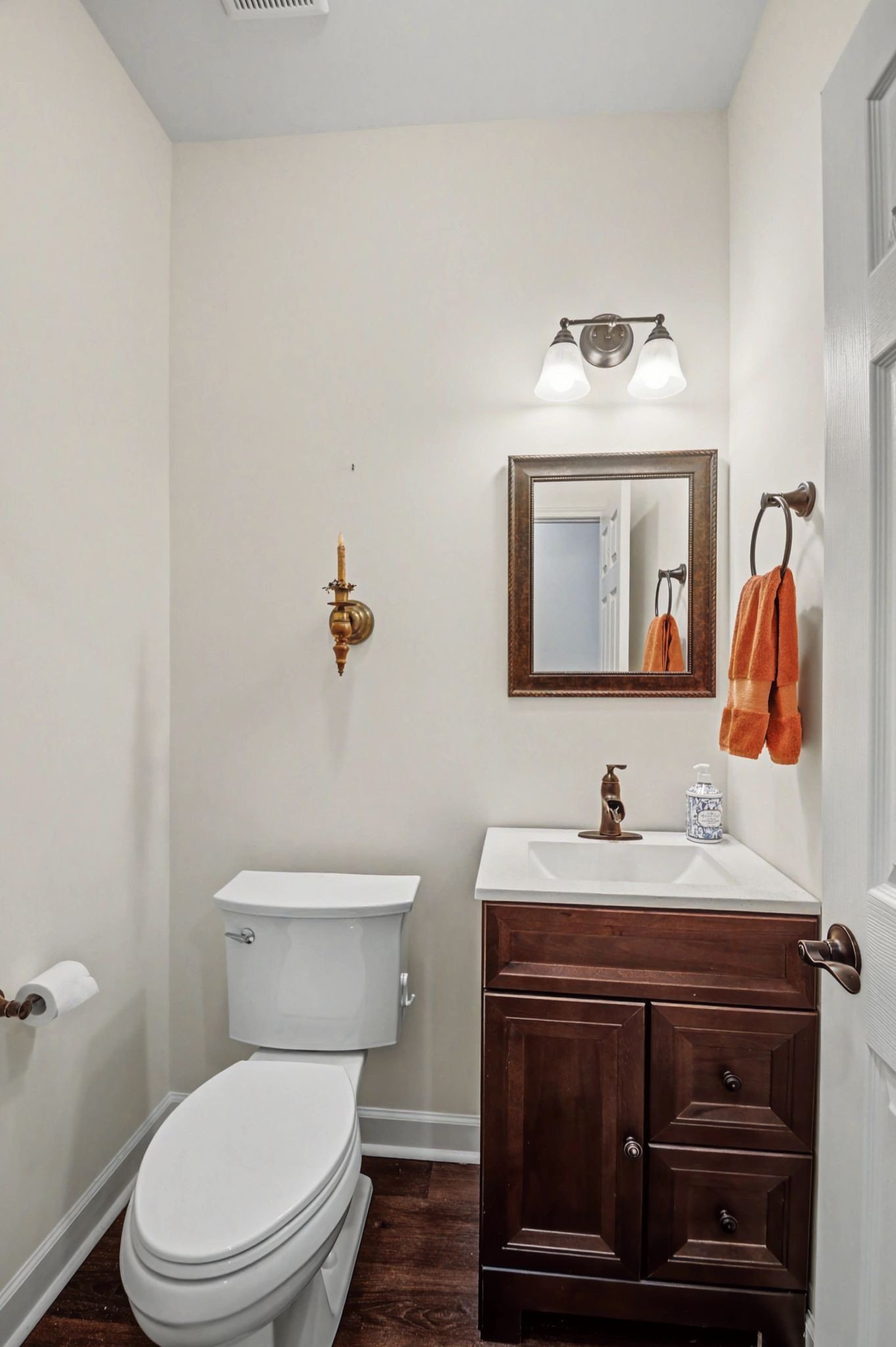 765 Scenic Circle Pulaski, TN 38478 - Photo 30 of 46 a bathroom with a toilet sink and mirror