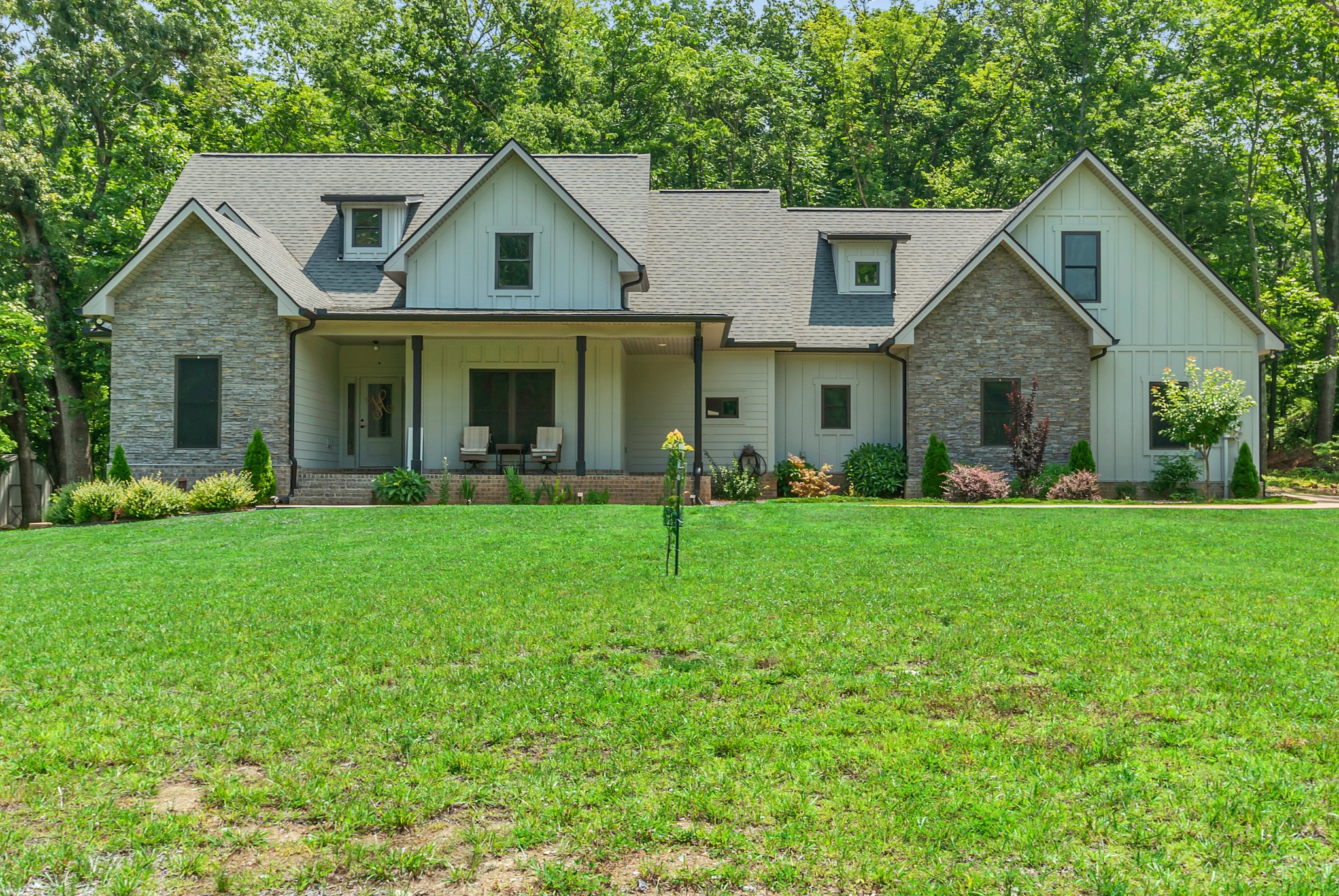 765 Scenic Circle Pulaski, TN 38478 - Photo 3 of 46 a front view of house with yard and green space