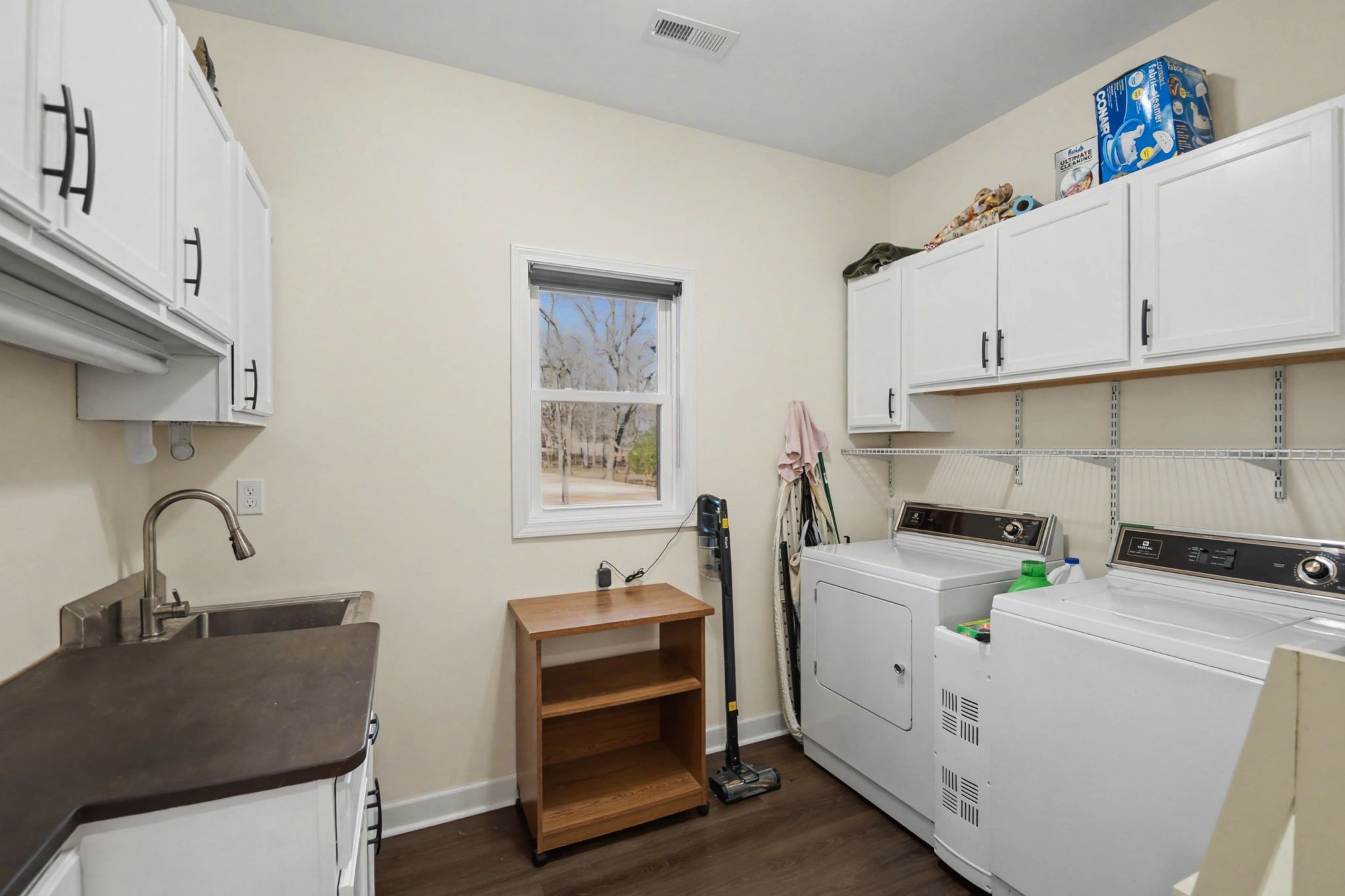 765 Scenic Circle Pulaski, TN 38478 - Photo 31 of 46 a view of a kitchen with sink dishwasher and fireplace