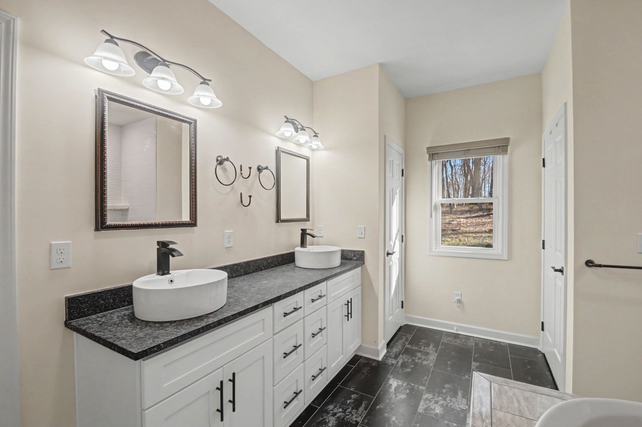 765 Scenic Circle Pulaski, TN 38478 - Photo 35 of 46 a bathroom with a sink and a mirror