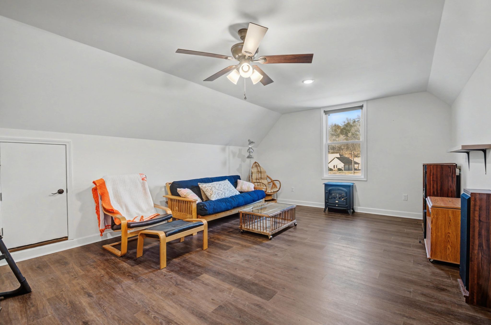 765 Scenic Circle Pulaski, TN 38478 - Photo 37 of 46 a living room with furniture a rug and a ceiling fan