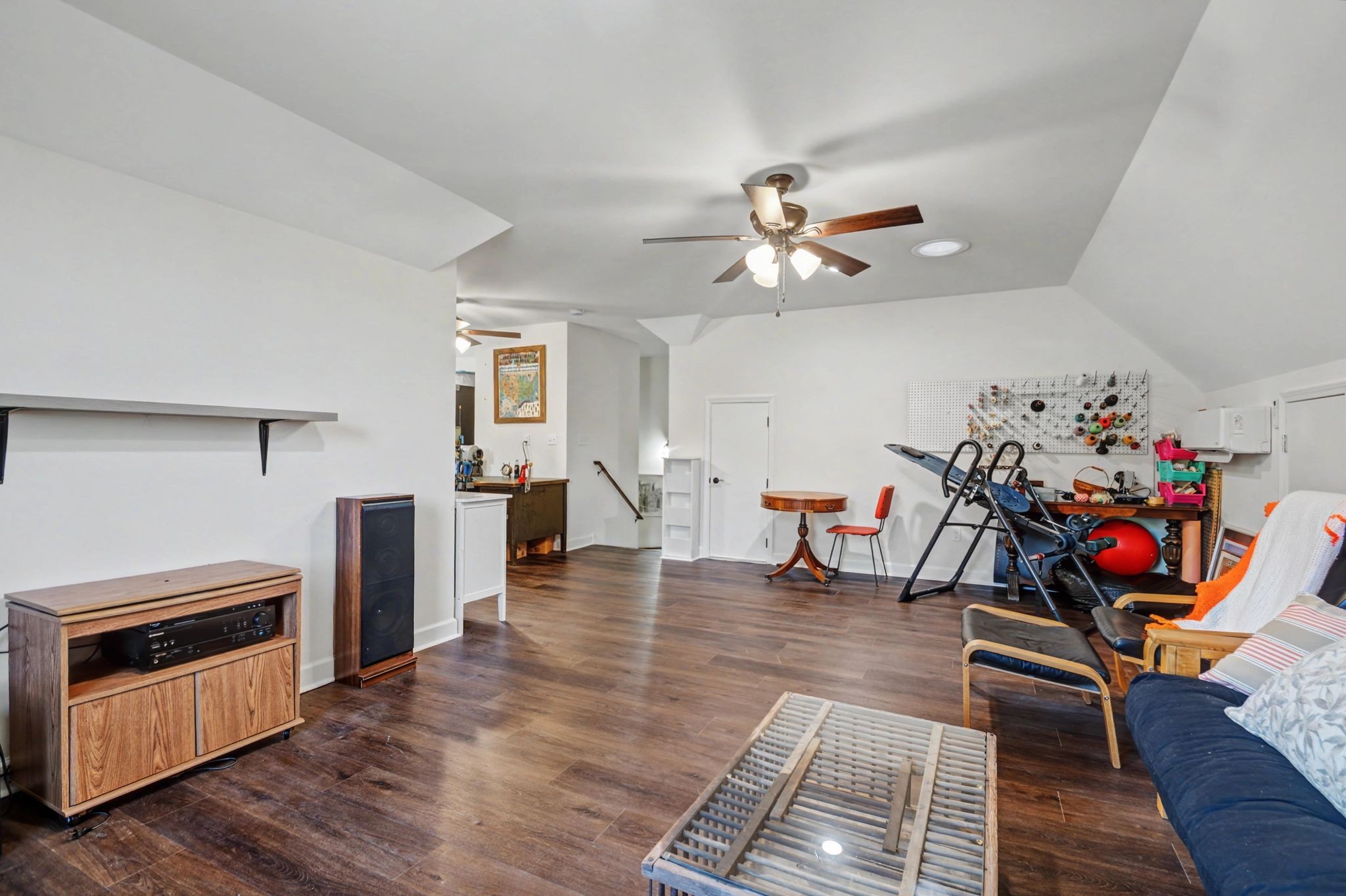 765 Scenic Circle Pulaski, TN 38478 - Photo 38 of 46 a view of a livingroom with furniture a ceiling fan and rug floor