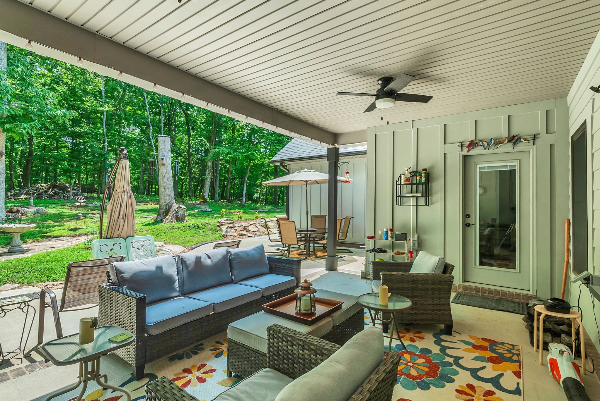 765 Scenic Circle Pulaski, TN 38478 - Photo 42 of 46 a living room with patio furniture and a yard