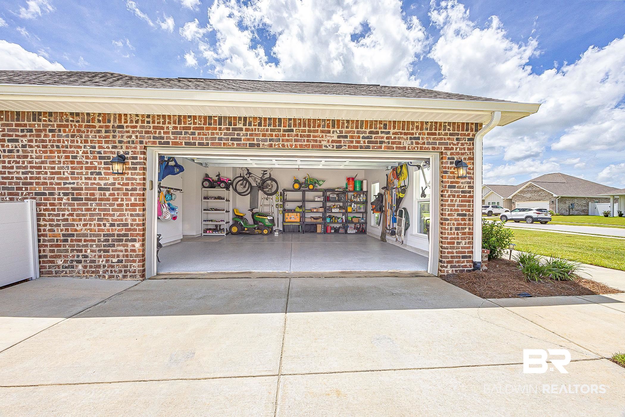 11044 Native Dancer Way Daphne, AL 36526 - Photo 37 of 67 View of garage