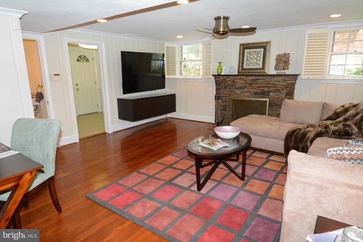 3239 Rittenhouse Street Northwest Washington, DC 20015 - Photo 24 of 30 Attractive rec room with fireplace