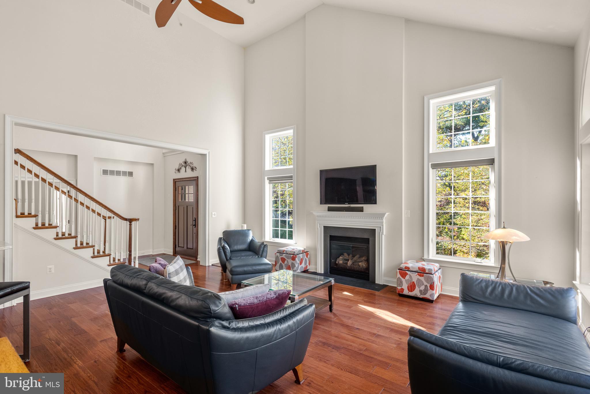 110 Dauphin Drive Springfield, PA 19064 - Photo 11 of 52 a living room with furniture fireplace and a window