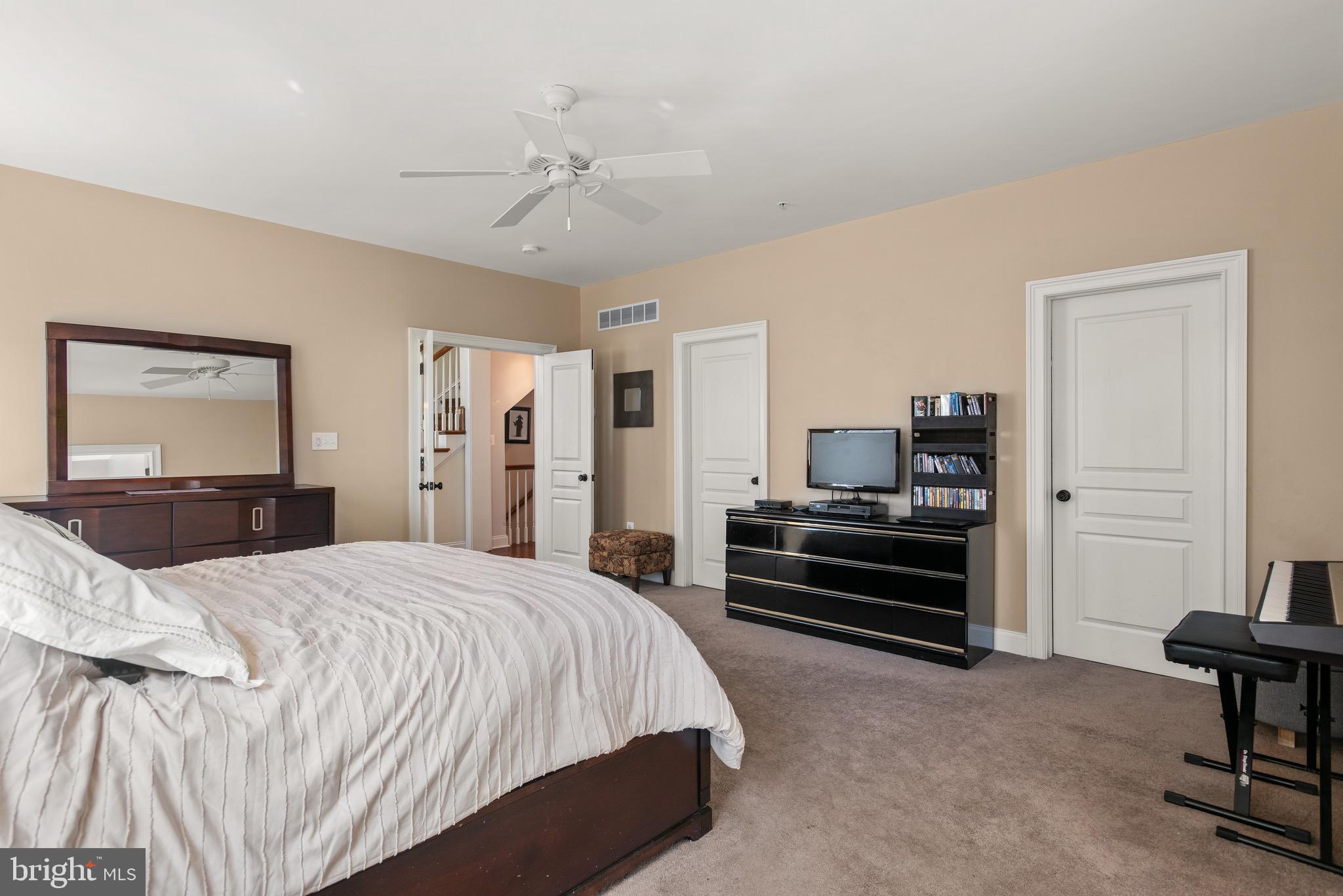 110 Dauphin Drive Springfield, PA 19064 - Photo 20 of 52 a bedroom with a bed and furniture