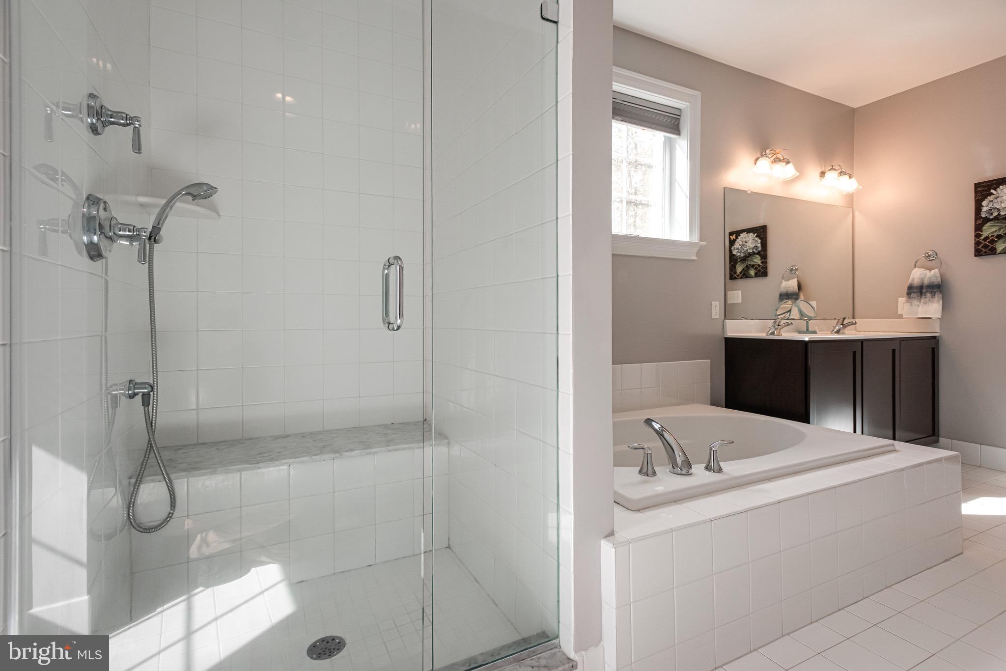110 Dauphin Drive Springfield, PA 19064 - Photo 22 of 52 a bathroom with a sink a toilet and shower