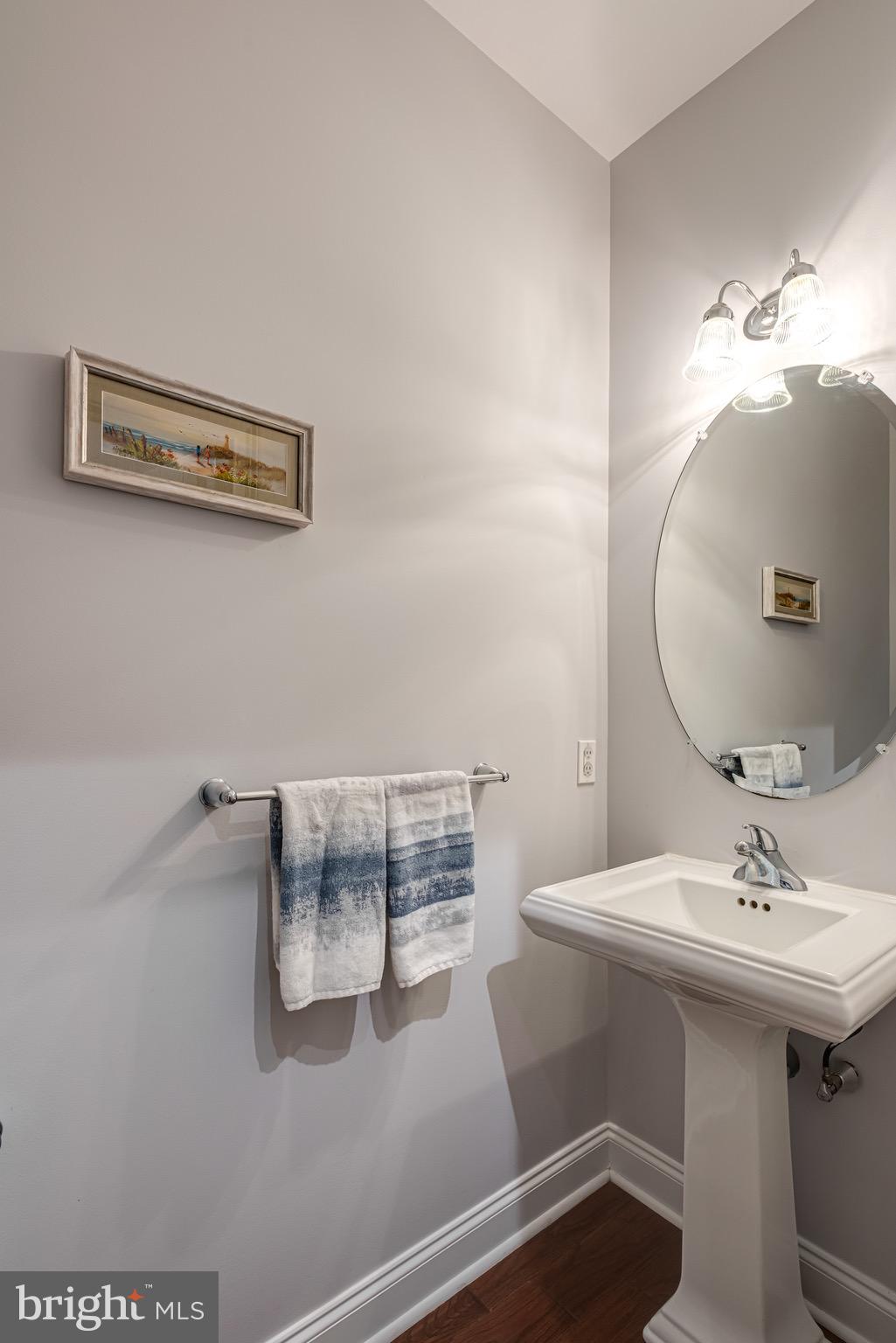 110 Dauphin Drive Springfield, PA 19064 - Photo 26 of 52 a bathroom with a sink mirror and vanity