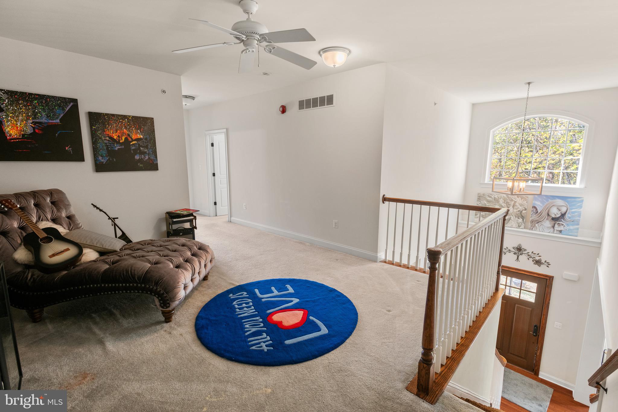 110 Dauphin Drive Springfield, PA 19064 - Photo 28 of 52 a living room with furniture and a window