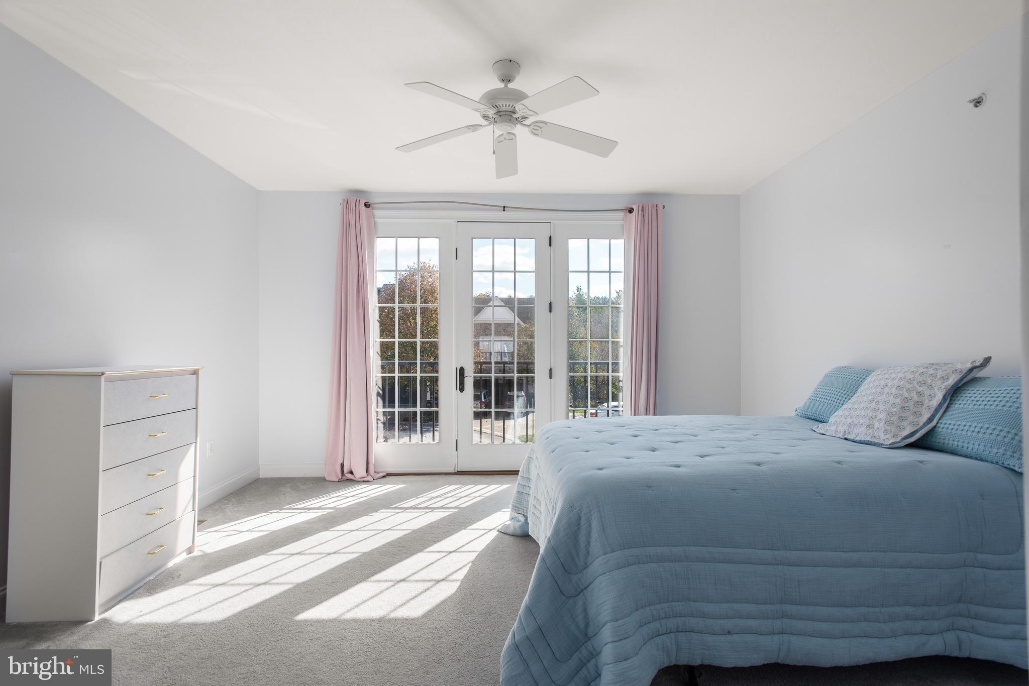 110 Dauphin Drive Springfield, PA 19064 - Photo 30 of 52 a bedroom with a bed and a large window