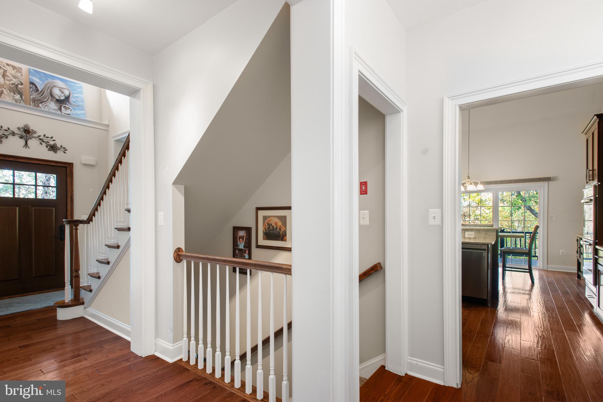 110 Dauphin Drive Springfield, PA 19064 - Photo 35 of 52 a view of a hallway with wooden floor and stairs