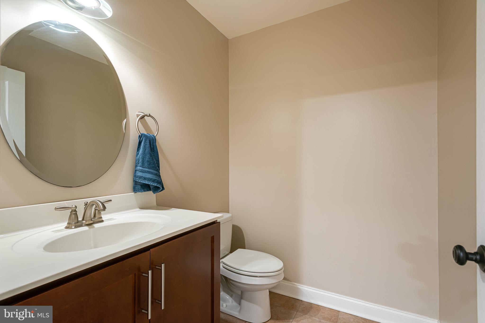 110 Dauphin Drive Springfield, PA 19064 - Photo 40 of 52 a bathroom with a sink and a toilet