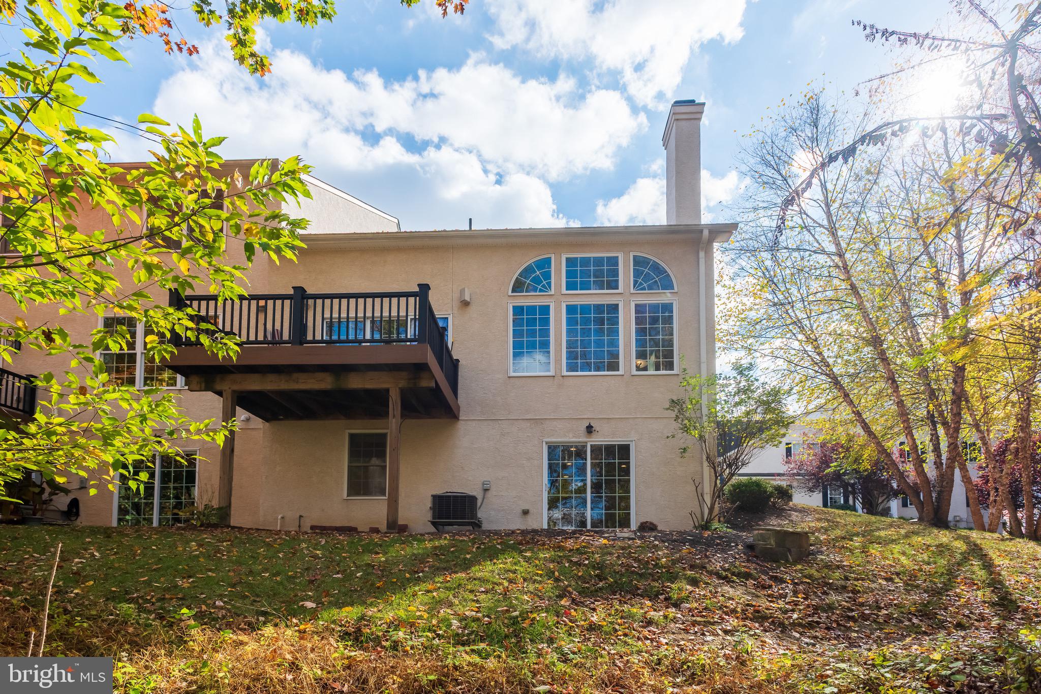 110 Dauphin Drive Springfield, PA 19064 - Photo 44 of 52 a front view of a house with a garden
