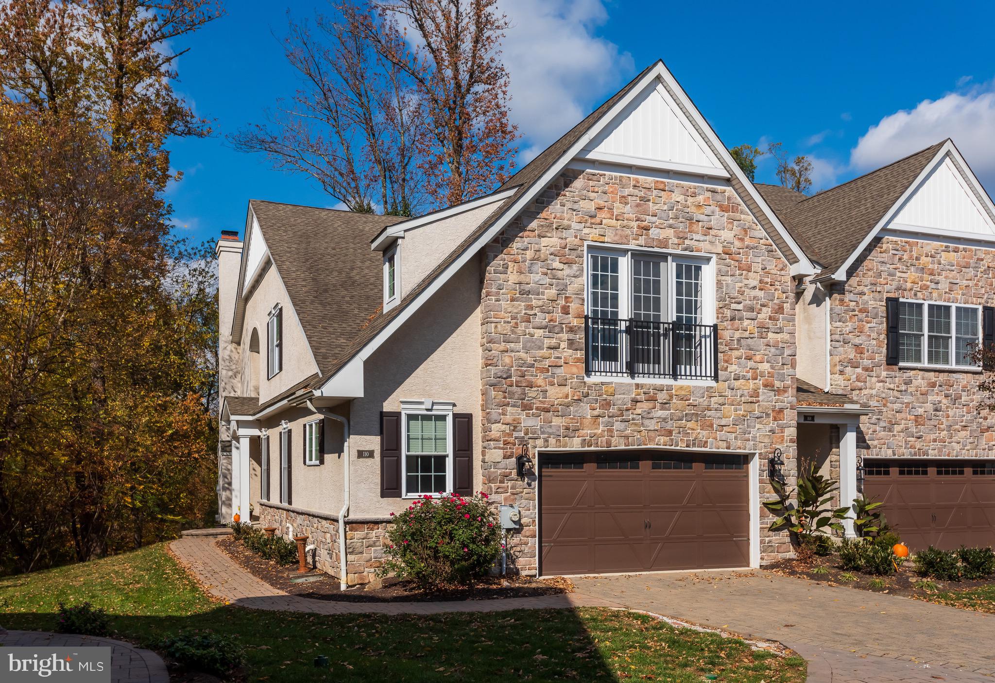 110 Dauphin Drive Springfield, PA 19064 - Photo 52 of 52 a front view of a house with a yard and garage