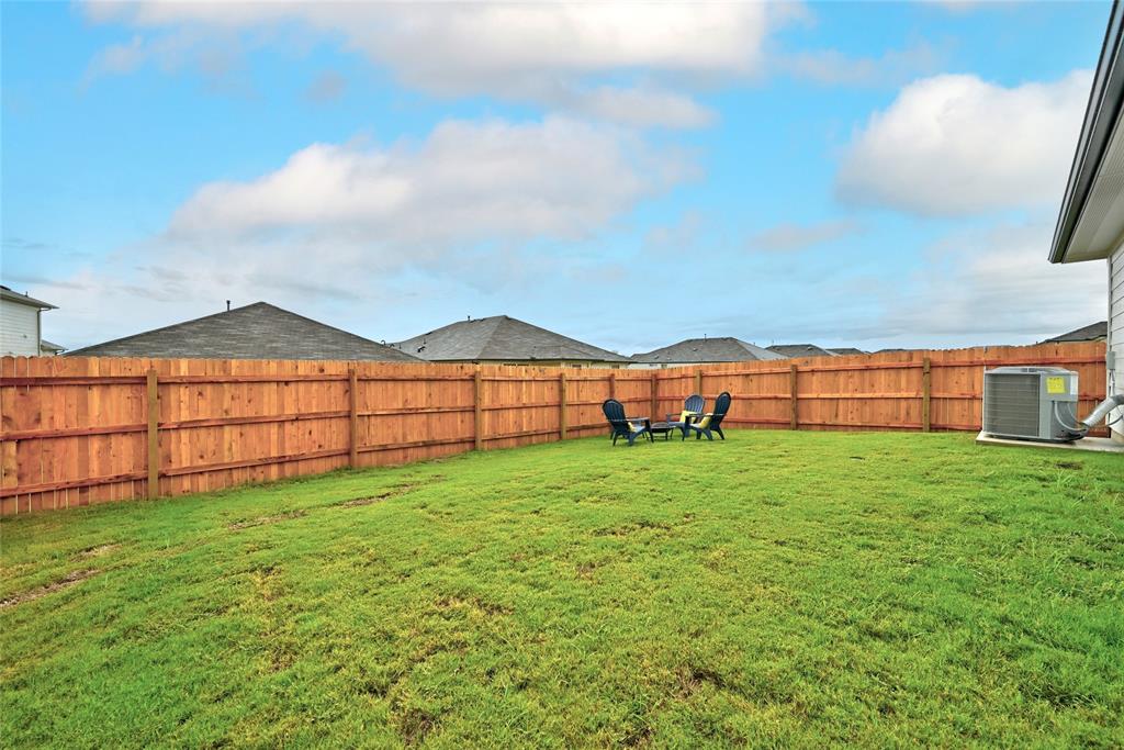 295 Evergreen Sumac Loop Kyle, TX 78640 - Photo 23 of 30 View of fenced backyard