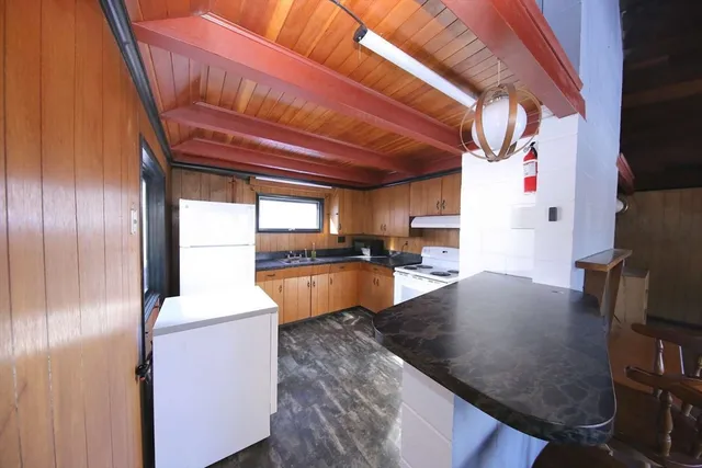 a kitchen with granite countertop lots of counter top space